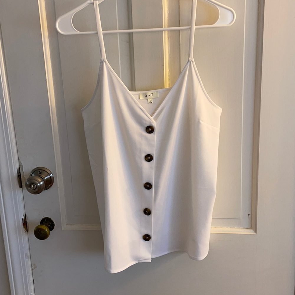 white tank with buttons